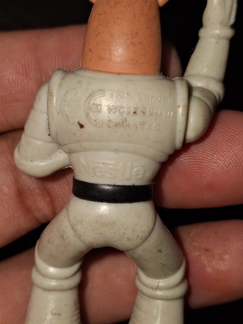 Nestle Space Astronaut Action Figure Toy (Category: Figurines & Statues) located in Manila. Submitted by marcas022798212 (Listing ID 1461265589, Image 3). Description: - Vintage Nestle Space Astronaut Toy - Made of durable plastic - Features articulated limbs for posing - Approximately 4 inches tall - Ideal for collectors or as a unique display piece.