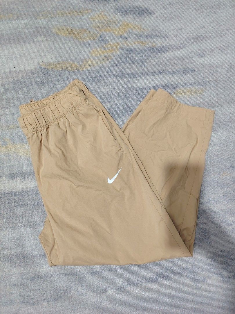 NIKE (Category: Chinos) located in Dagupan City. Submitted by gandita.28 (Listing ID 1461174984, Image 3). Description: NIKE KHAKI COLOR EXCELLENT CONDITION LENGTH - 34.5 HEM - 7 XL ON TAG.