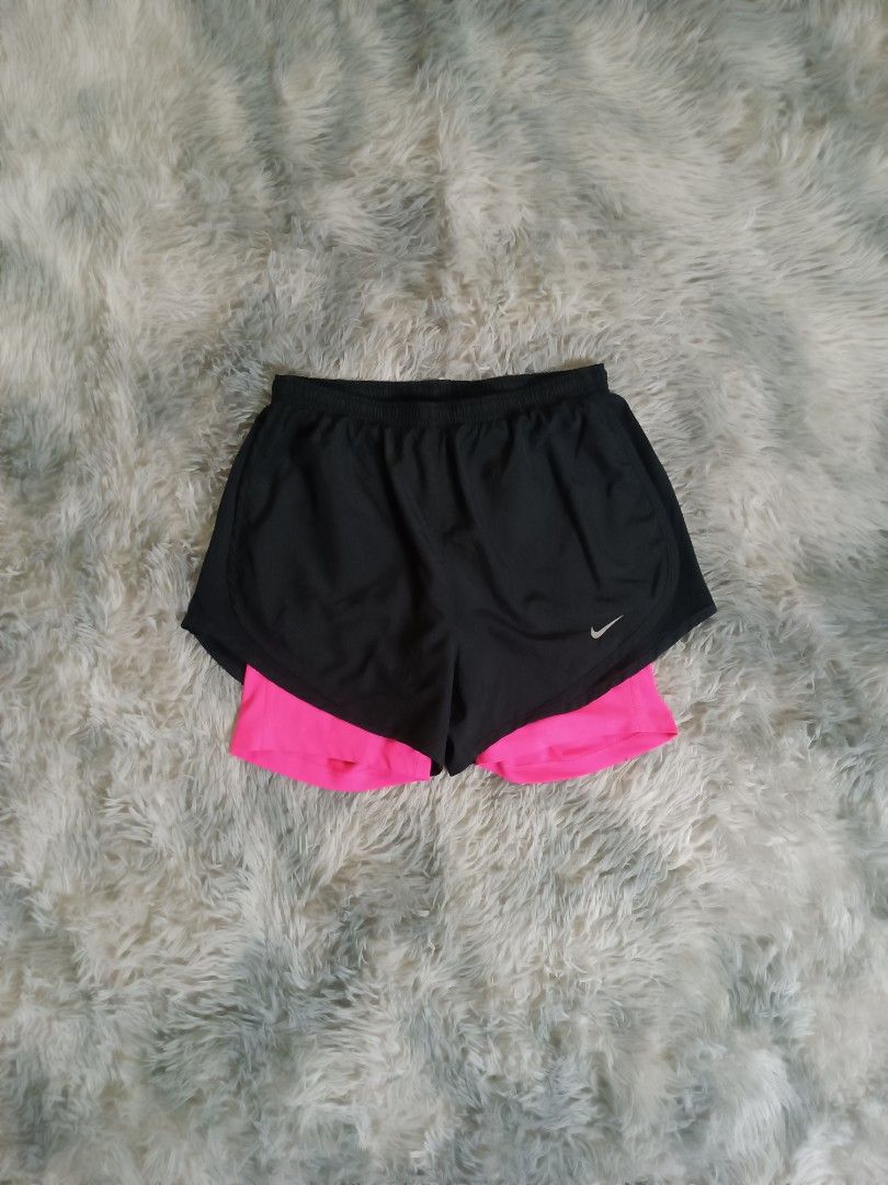 Nike 2 in 1 Training/Running Short (Category: Shorts) located in Mandaluyong City. Submitted by retro.199x (Listing ID 1461132254, Image 1). Description: SIZE SMALL ON TAG Waist: 26-34 Length: 10.5 Leg Opening: 12 EXCELLENT CONDITION.