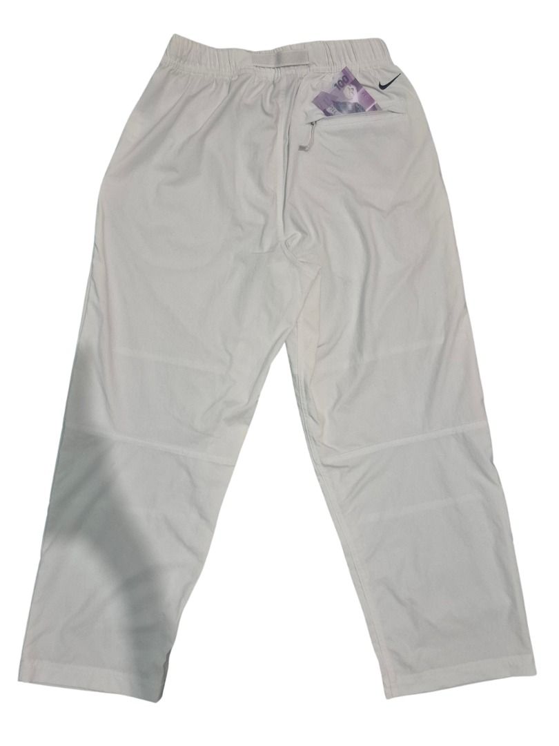 Nike ACG Hike Pants White Size M (Category: Other Bottoms) located in Manila. Submitted by segundamanoy (Listing ID 1461228885, Image 2). Description: - White Nike ACG UV Hike Pants MR - Size: Medium (M) - Material: 96% Nylon, 4% Spandex DIMES 📏: - Waist: 26-28" - Length: 37" - Hem: 8" - Features: Side pockets - Ideal for outdoor adventures and hiking ‼️PRICE IS NEGOTIABLE.