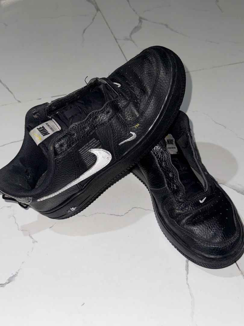 Nike Air Force 1 Utility Black White GS (Category: Sneakers) located in Caloocan City. Submitted by cenchy.lux (Listing ID 1461138814, Image 2). Description: NIKE AIR FORCE 1 UTILITY LOW BLACK/WHITE GS AR1708-001 • Original Nike pair • Lightly used • Good condition • No major flaws • Clean overall • Classic black & white colorway.
