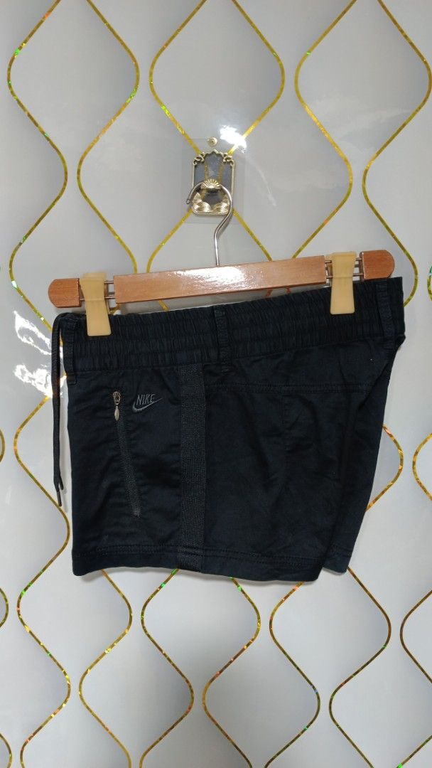 Nike Black Athletic Shorts with Zipper Pockets (Category: Shorts) located in Manila. Submitted by zariyah.1986 (Listing ID 1461239633, Image 3). Description: - Black Nike shorts - Elastic waistband with drawstring - Two zippered front pockets - Made from cotton and spandex blend - Comfortable and breathable material - Ideal for sports or casual wear -Size: Large on tag(32×11).