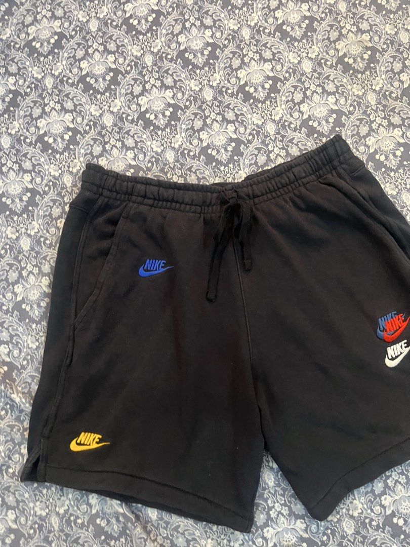 Nike Black Shorts Size L (Category: Shorts) located in Batangas. Submitted by gavsandrix (Listing ID 1461146253, Image 2). Description: - Black Nike Shorts - Size: L - Made in Pakistan - Multiple colored Nike logos - Elastic waistband with drawstring - Side pockets and back pocket - Comfortable material for everyday wear.