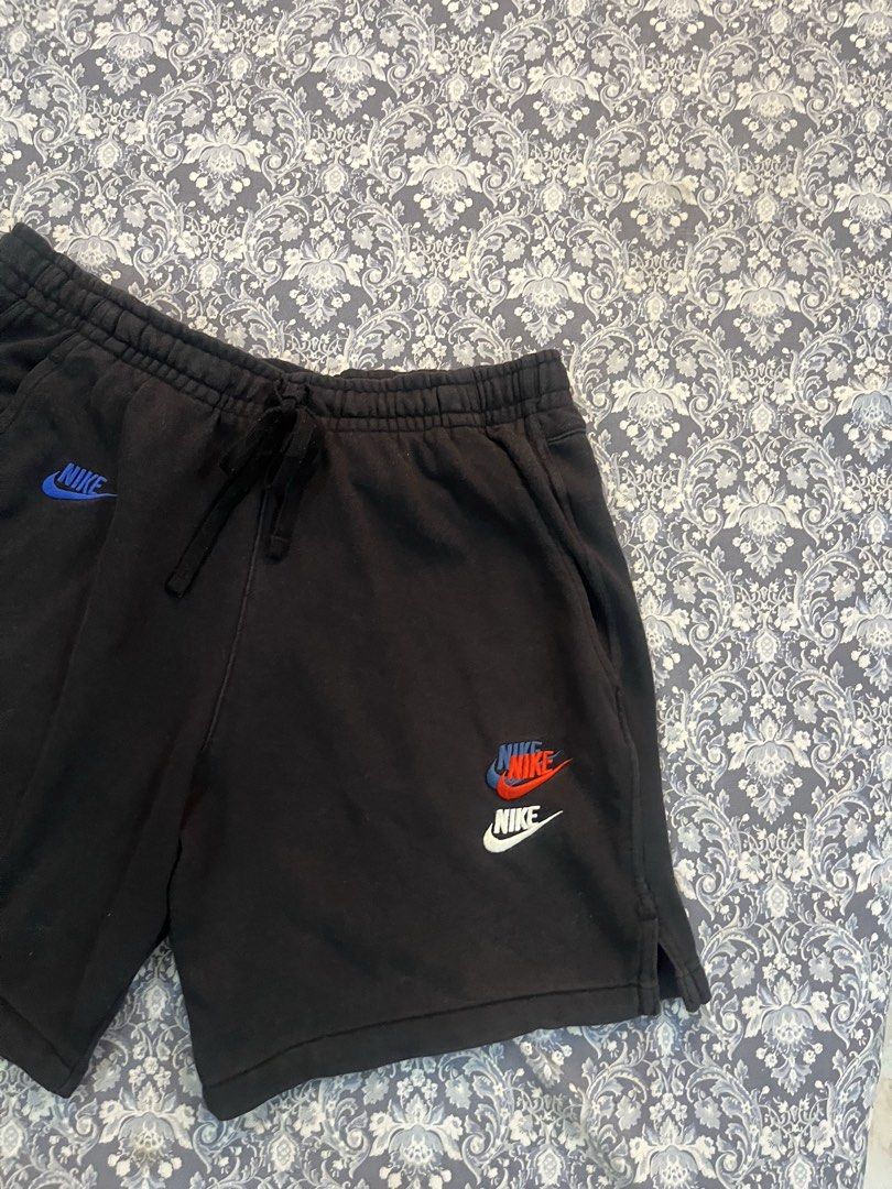 Nike Black Shorts Size L (Category: Shorts) located in Batangas. Submitted by gavsandrix (Listing ID 1461146253, Image 3). Description: - Black Nike Shorts - Size: L - Made in Pakistan - Multiple colored Nike logos - Elastic waistband with drawstring - Side pockets and back pocket - Comfortable material for everyday wear.
