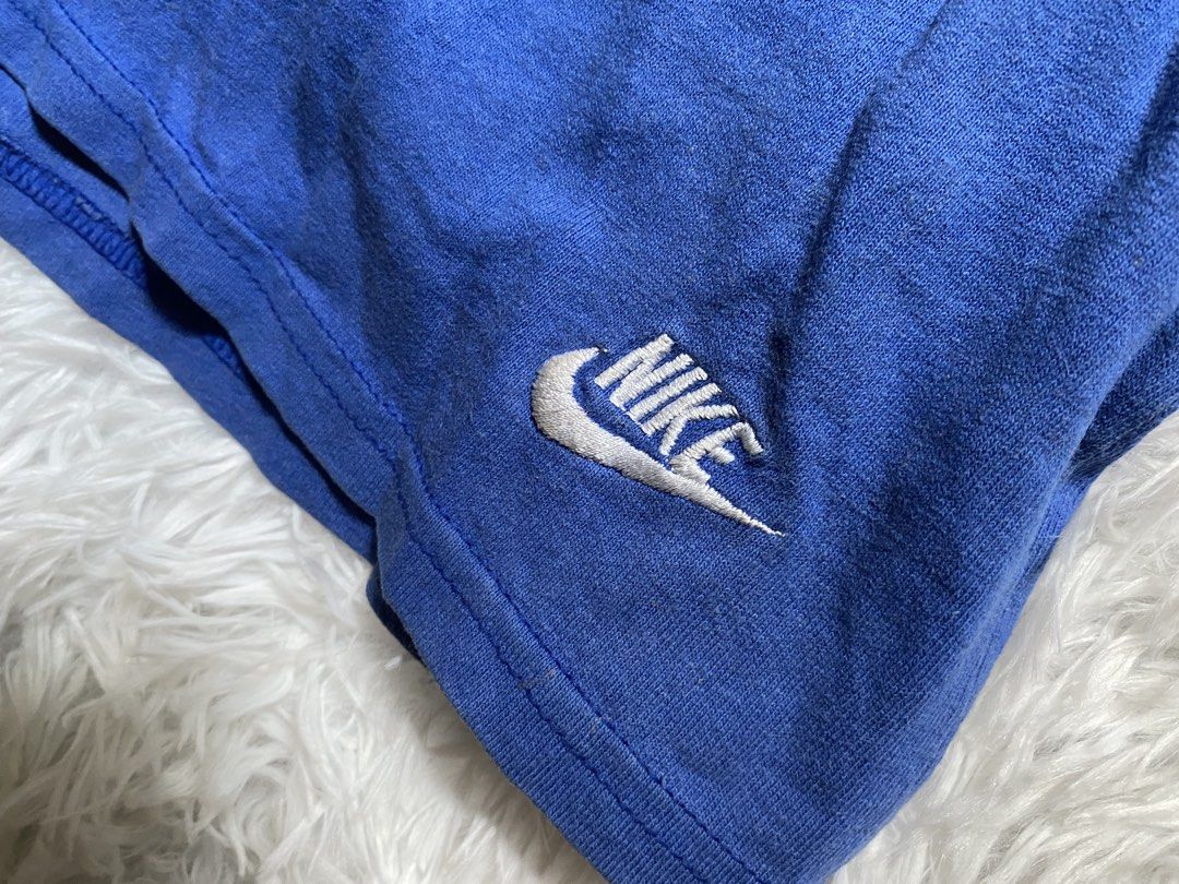 Nike Blue Cotton Shorts Size S (Category: Shorts) located in Zamboanga. Submitted by trippsnthrifts (Listing ID 1461257943, Image 3). Description: - Blue Nike shorts - 100% Cotton - Elastic waistband with drawstring - Small embroidered Nike logo on left leg - Ideal for lounging or casual wear - Made in USA.