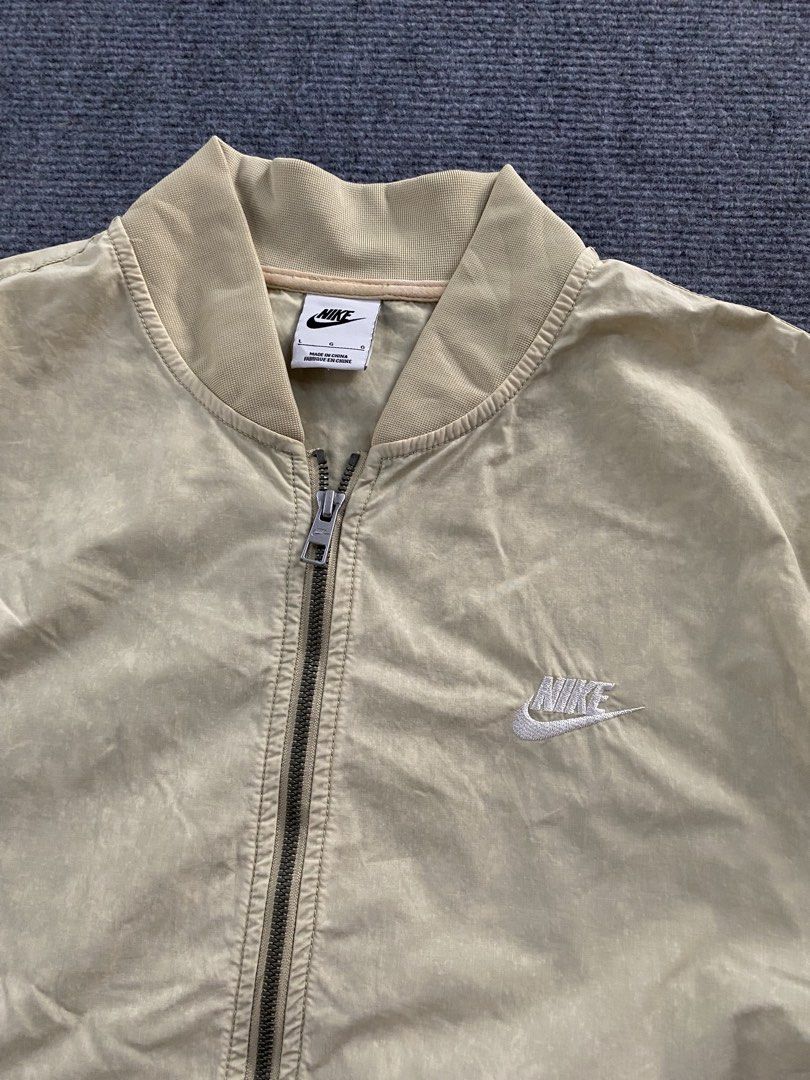 Nike bomber jacket (Category: Coats, Jackets and Outerwear) located in Manila. Submitted by j4y_thrift (Listing ID 1461192071, Image 2). Description: Note: Color may due to lightning conditions please please manage your expectations since item are used.