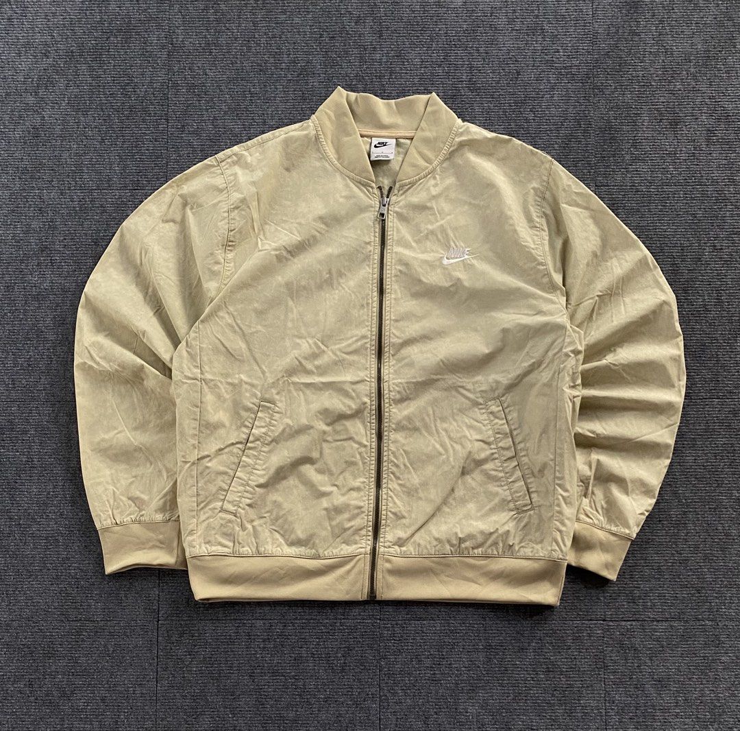 Nike bomber jacket (Category: Coats, Jackets and Outerwear) located in Manila. Submitted by j4y_thrift (Listing ID 1461192071, Image 1). Description: Note: Color may due to lightning conditions please please manage your expectations since item are used.