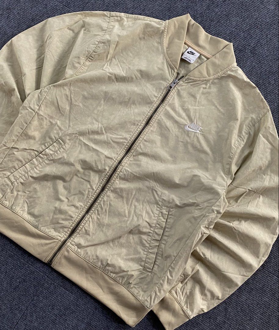 Nike bomber jacket (Category: Coats, Jackets and Outerwear) located in Manila. Submitted by j4y_thrift (Listing ID 1461192071, Image 3). Description: Note: Color may due to lightning conditions please please manage your expectations since item are used.