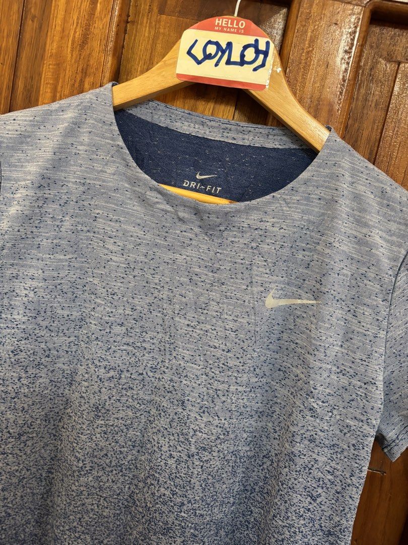 Nike Dri-FIT Running T-Shirt Blue Gradient (Category: Activewear) located in Davao. Submitted by jlmadapaker (Listing ID 1461262587, Image 3). Description: Nike Dri-FIT Running T-Shirt Blue Gradient Good as new condition L on tag. 19with,25.5length Color rate 9.5/10 - Blue Gradient Colorway No issue and washed 350+shipping - Lightweight Nike Dri-FIT t-shirt - Ideal for running and workouts - Breathable fabric to keep you cool - Stylish blue gradi