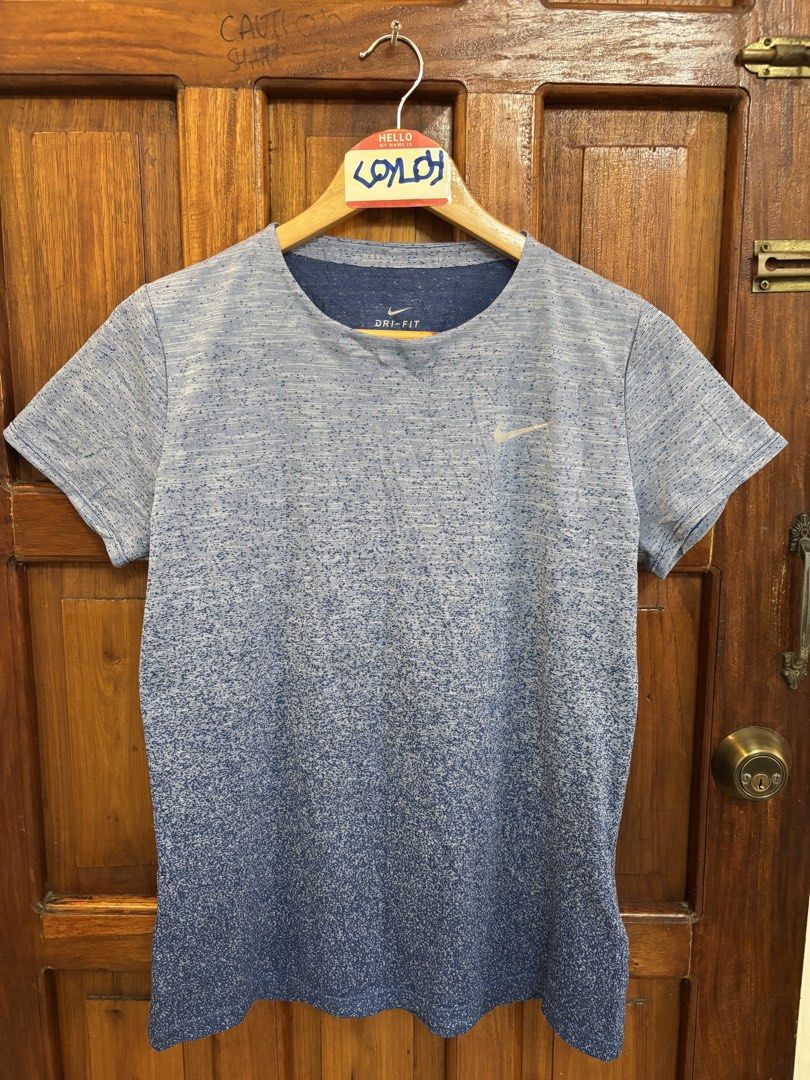 Nike Dri-FIT Running T-Shirt Blue Gradient (Category: Activewear) located in Davao. Submitted by jlmadapaker (Listing ID 1461262587, Image 2). Description: Nike Dri-FIT Running T-Shirt Blue Gradient Good as new condition L on tag. 19with,25.5length Color rate 9.5/10 - Blue Gradient Colorway No issue and washed 350+shipping - Lightweight Nike Dri-FIT t-shirt - Ideal for running and workouts - Breathable fabric to keep you cool - Stylish blue gradi