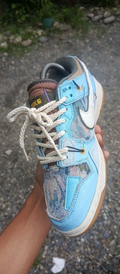Nike Dunk Low "City Market" (Category: Sneakers) located in Manila. Submitted by totiredtorunaway (Listing ID 1461238144, Image 2). Description: - Nike Dunk Low City Market sneakers - Unique patchwork design with light blue, brown, and patterned panels - Features a classic gum sole - Comes with thick white laces - Ideal for sneaker collectors or those seeking a standout shoe.