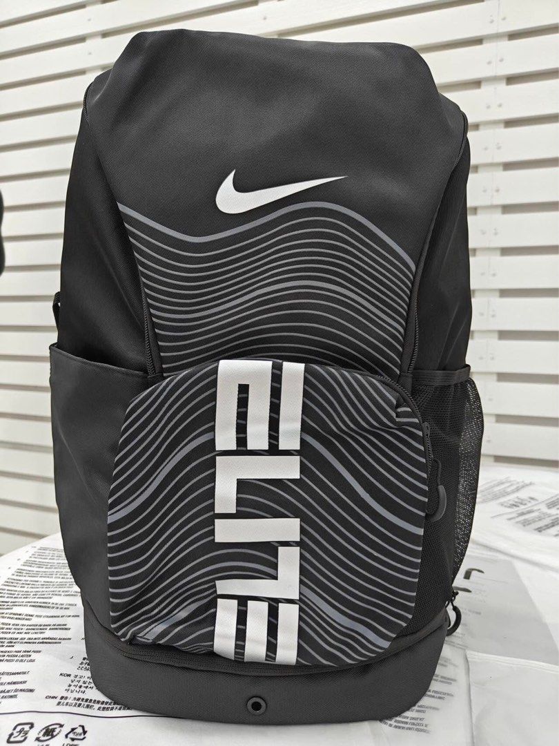 Nike Elite Backpack V6 (Category: Backpacks) located in Taguig. Submitted by courtsidecollection (Listing ID 1461119840, Image 1). Description: - Nike Elite Backpack with iconic Nike swoosh and 'Elite' graphic. - Available in multiple colorways to suit your style. - Features convenient side mesh pockets for water bottles or essentials. - Includes a front zip compartment for secure storage. - Made with durable material for long-lasting use. - Idea
