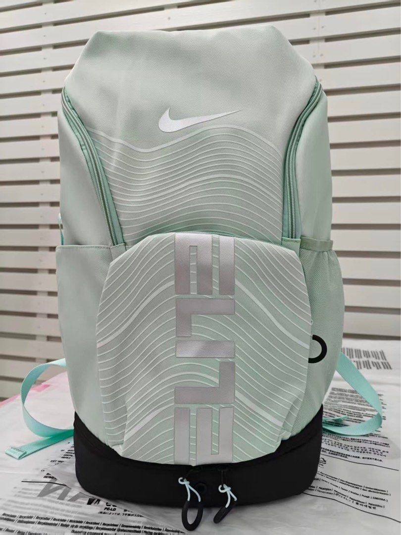Nike Elite Backpack V6 (Category: Backpacks) located in Taguig. Submitted by courtsidecollection (Listing ID 1461119840, Image 2). Description: - Nike Elite Backpack with iconic Nike swoosh and 'Elite' graphic. - Available in multiple colorways to suit your style. - Features convenient side mesh pockets for water bottles or essentials. - Includes a front zip compartment for secure storage. - Made with durable material for long-lasting use. - Idea