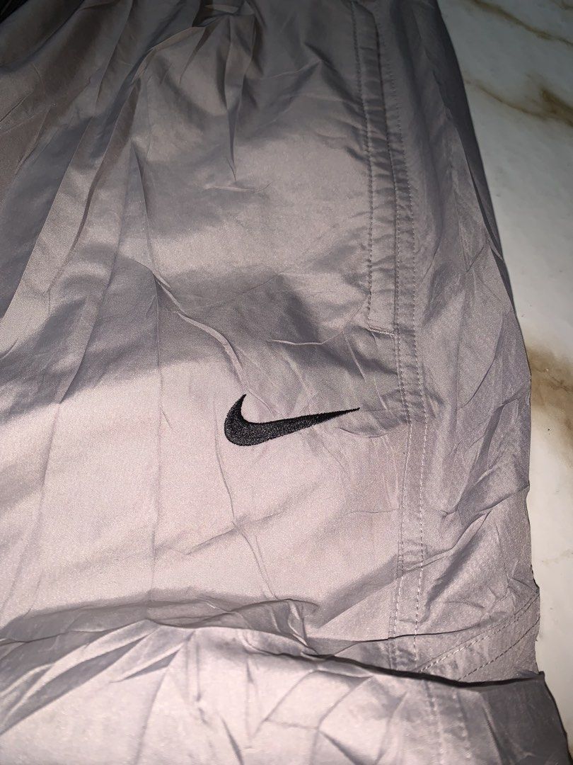 Nike Grey Polyester Nylon Track Pants Joggers Size XL (Category: Joggers) located in Iloilo. Submitted by johnpullan30303 (Listing ID 1461267289, Image 2). Description: - Grey Nike track pants - Made from polyester and nylon - Elastic waistband with drawstring - Size XL - Ideal for sports or casual wear - Please check photos for detailed condition.