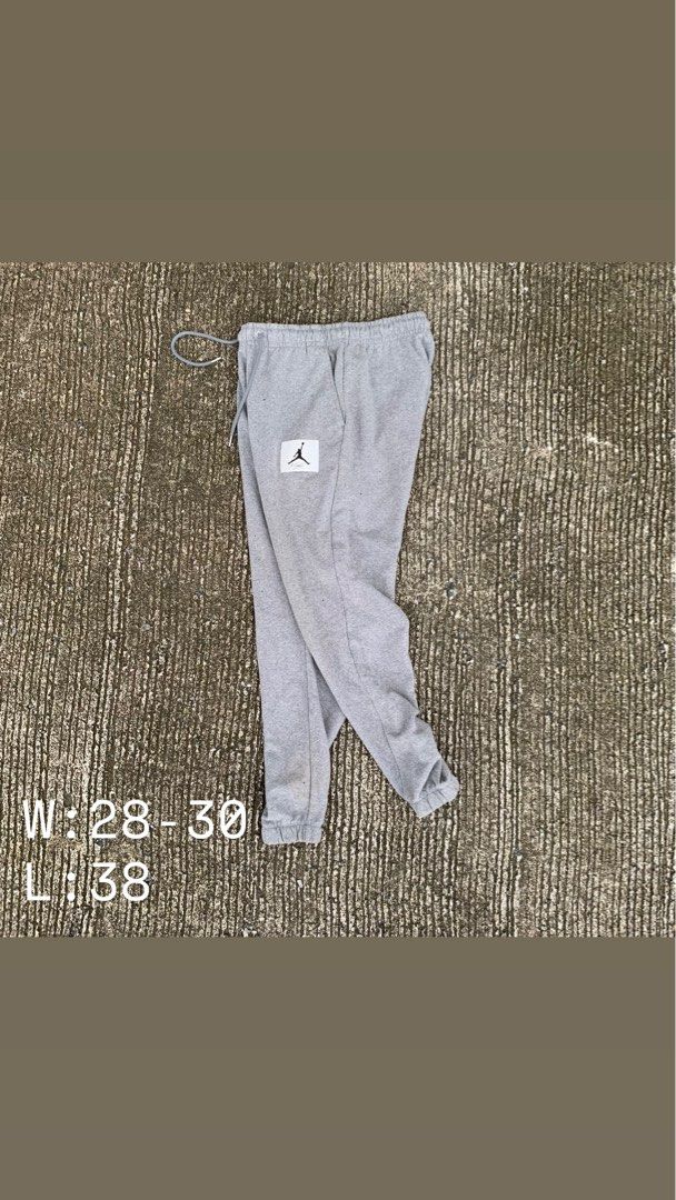 Nike Jordan Essentials Fleece Pants grey (Category: Joggers) located in Manila. Submitted by _thrift.clothes._ (Listing ID 1461323054, Image 1). Description: Size:Medium W:28-30 L:38.