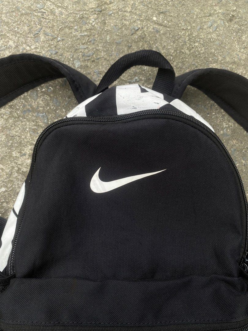 NIKE JUST DO IT BACKPACK (Category: Backpacks) located in Imus. Submitted by chararatzx. (Listing ID 1461196675, Image 3). Description: VERY GOOD CONDITION WITH ISSUE SEE DETAILS ON PIC (NORMAL SA 2nd hand) (authentic nike bag) PRICE CAN DO OFFER .