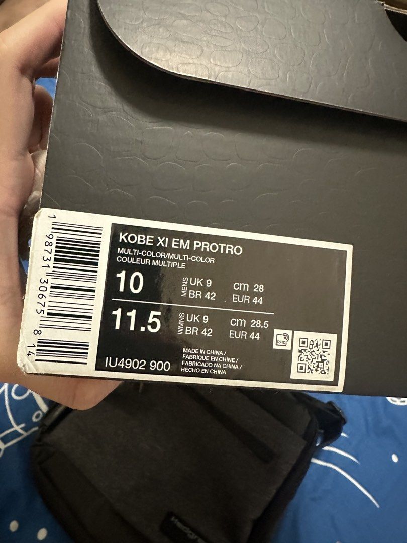 Nike Kobe XI EM Protro "Numbers" Black Gold (Category: Sneakers) located in Pasig City. Submitted by ayows (Listing ID 1461290294, Image 2). Description: Decluttering - gifted by my Tito, pero di kasi ako nagbabasketball HAHA - Nike Kobe XI EM Protro - Color: Black with gold numbers graphic - Sole: Translucent blue - Size: US Men's 10 - Condition: Comes with original box - Ideal for: Collectors and players.