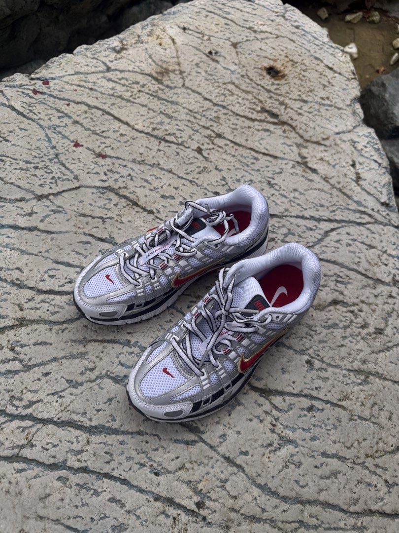 Nike P-6000 — Metallic Silver / Red (Category: Sneakers) located in Bulacan. Submitted by gohmenasai (Listing ID 1461177636, Image 1). Description: Nike P-6000 — Metallic Silver / Red Price: ₱3,000 Size: US 6 Condition: Pre-loved Location: Guiguinto, Bulacan Payment: GCash Buyer shoulders shipping fee. • Same-day delivery: Lalamove (from Guiguinto, Bulacan) • Standard courier: J&T Express Payment first before shipping..