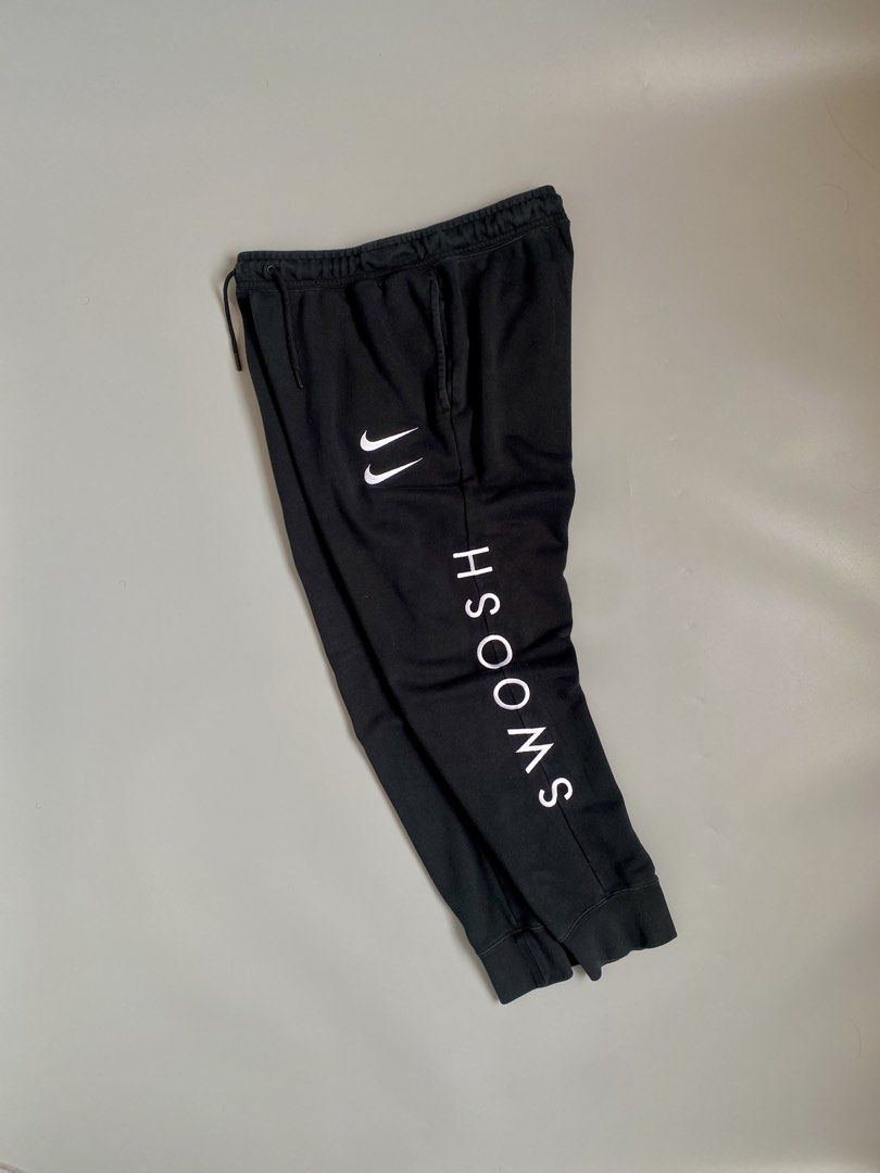 NIKE Multiple Swoosh Sweatpants (Category: Joggers) located in Cavite. Submitted by awuuu27 (Listing ID 1461263056, Image 1). Description: NIKE Multiple Swoosh Sweatpants 💎 DIMES: Width-32-38/Length-36/Leg Opening-5/Thigh-13.5 CONDITION: 9/10 COLOR RATE: 9/10 ISSUE: none .