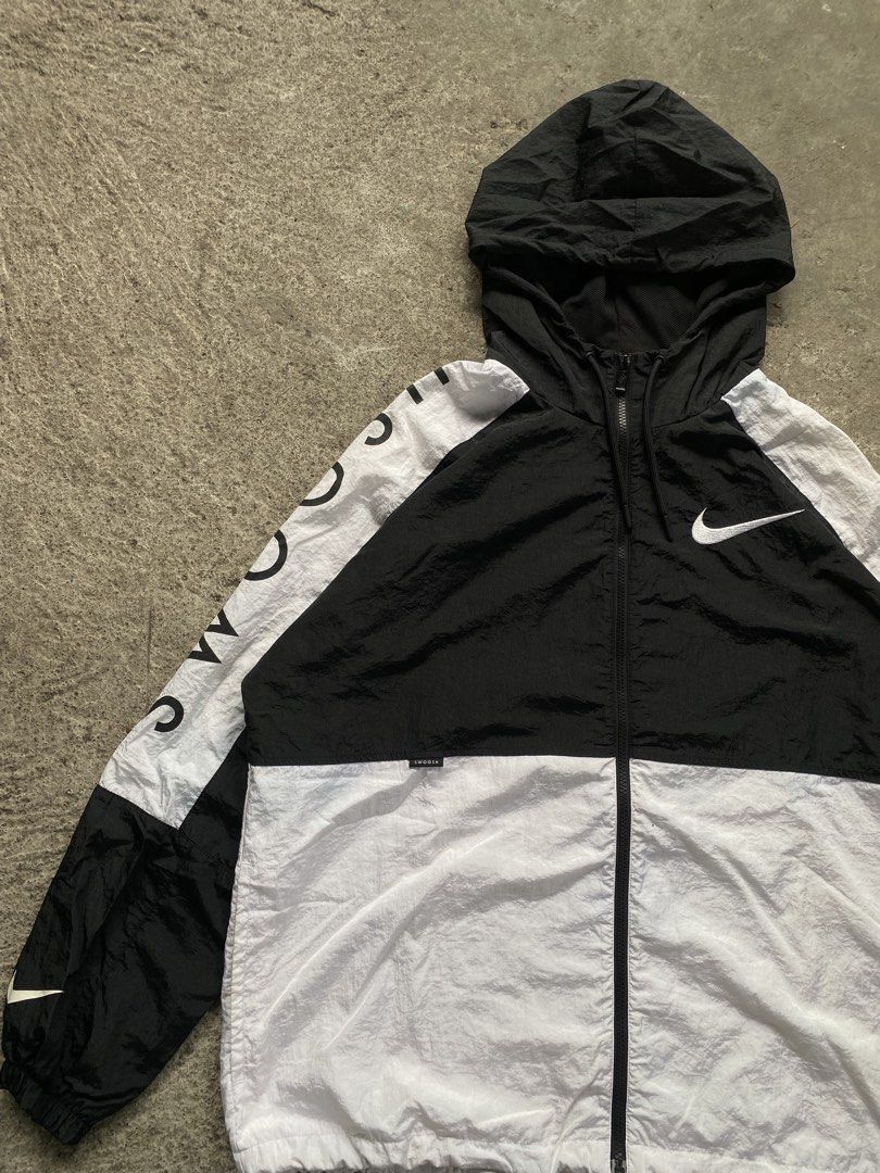 Nike Swoosh Windbreaker Jacket (Category: Coats, Jackets and Outerwear) located in Rizal. Submitted by various.stuff (Listing ID 1461253991, Image 3). Description: Item: Nike Swoosh Windbreaker Jacket Dimes: 26 x 29.5 Condition: Very Good Color rate: 9/10 Issue: blue stain, see pics.