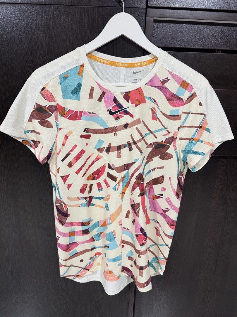 Nike Tennis and Running Top (Category: Activewear) located in Pasay City. Submitted by josec03 (Listing ID 1461256944, Image 2). Description: Barely used. 1 tennis top and 1 running top. Both size Small. Selling as pack for only 1,995.