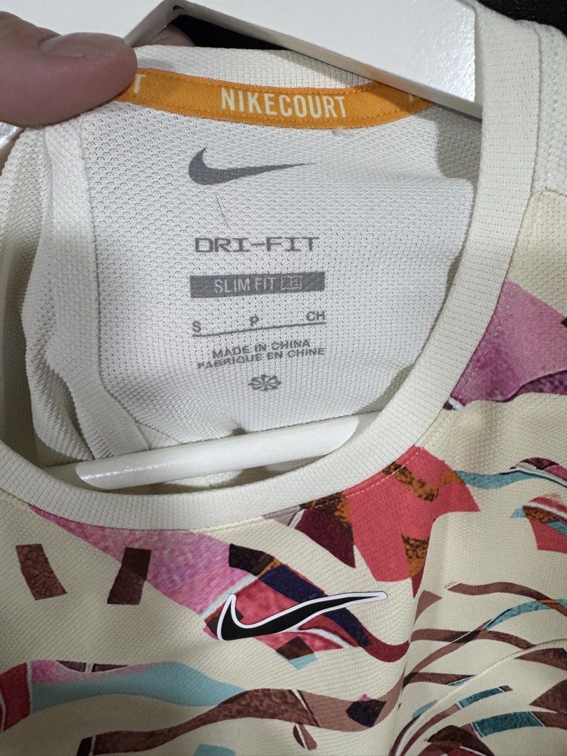 Nike Tennis and Running Top (Category: Activewear) located in Pasay City. Submitted by josec03 (Listing ID 1461256944, Image 3). Description: Barely used. 1 tennis top and 1 running top. Both size Small. Selling as pack for only 1,995.