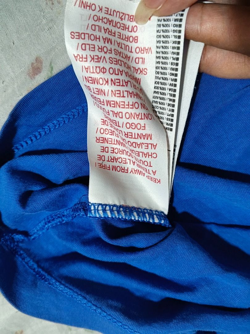 Nike T-shirt Blue Just Do It (Category: Tshirts & Polo Shirts ) located in Caloocan City. Submitted by nebs_seller (Listing ID 1461220872, Image 3). Description: - Classic blue Nike t-shirt - Features iconic swoosh logo - Includes 'Just Do It' slogan - Made from comfortable cotton material - Ideal for casual outings or workouts - Versatile: pairs easily with jeans or shorts.