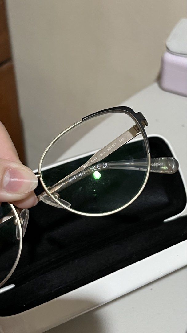 Nine West Eyeglass Presctiption with Case (Category: Sunglasses & Eyewear) located in Pasig City. Submitted by thegoodfinds2 (Listing ID 1461243916, Image 3). Description: - Brand: Nine West - Frame Color: Gold and Black - Style: Chic, suitable for everyday wear - Includes: Original Nine West hard case - Model: NW7001L-B - Lens Size: 53mm - Bridge Width: 17mm - Temple Length: 140mm Selling for FRAME purposes only, since graded lens, just get new 
