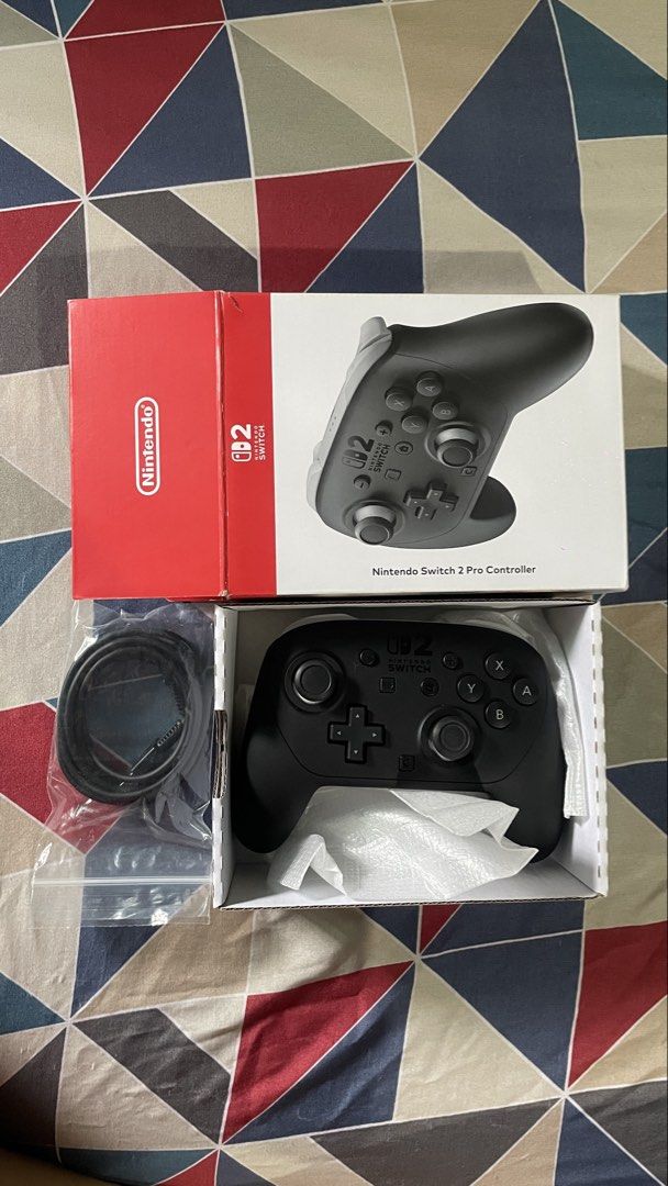 Nintendo Switch 2 Pro Controller with Charging Cable (Category: Controllers) located in Manila. Submitted by stepheugenio (Listing ID 1461199377, Image 2). Description: - Nintendo Switch Pro 2 Controller - Includes original charging cable - Comes in original packaging .