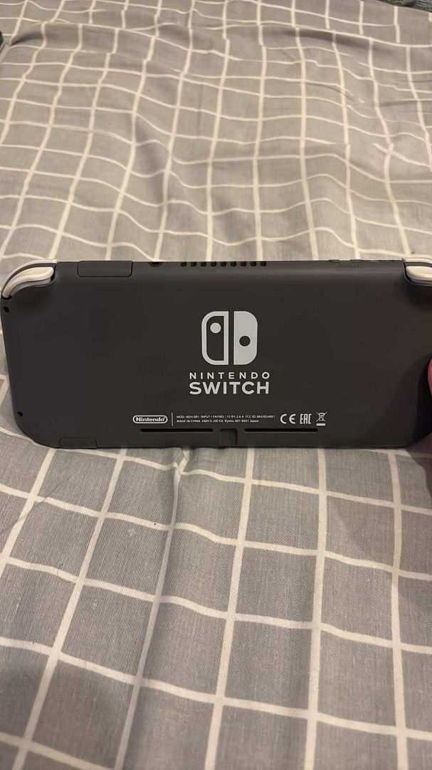 Nintendo Switch Lite with Carrying Case for FREE (Category: Nintendo) located in Manila. Submitted by richardha97759 (Listing ID 1461288016, Image 2). Description: - Black carrying case for Nintendo Switch Lite - Comes with Charger Completely working. Good as new hardly used. RFS: Pandemic purchase. Never used since then..