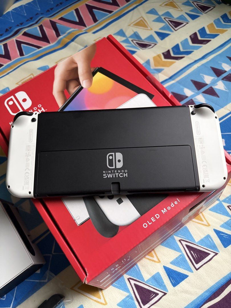 Nintendo Switch OLED Model White - Complete Set with Box (Category: Nintendo) located in Cainta. Submitted by alingjess (Listing ID 1461209777, Image 3). Description: - Nintendo Switch OLED Model (White) - Includes console, dock, Joy-Cons, AC adapter, and HDMI cable - All original accessories included in the box - No issues or damages - RFS: Upgrade to Switch 2 - ₱10,000 LAST PRICE, NO HAGGLING OR LOWBALLING PLS - GCash / BDO - Lalamove / LBC.