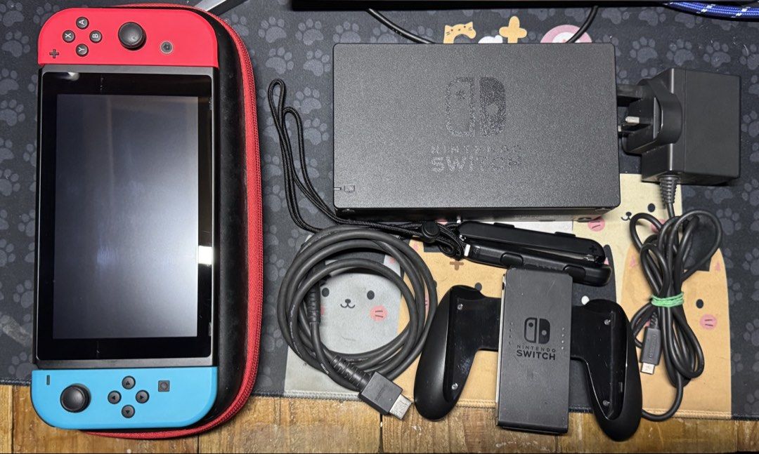 Nintendo Switch V1 (Category: Other Gadgets) located in Taguig. Submitted by skibbiditoilet (Listing ID 1461217699, Image 1). Description: WTS Nintendo Switch V1 - no jailbreak, no games, no SD Card inclusions: - Nintendo Switch V1 Console - Nintendo Switch Dock - Joycon Grip - Joycon Wrist Strap L & R - HDMI Cable - Charger - Case issues: have scratches on the screen (see pictures) rfs: decluttering 📍taguig.