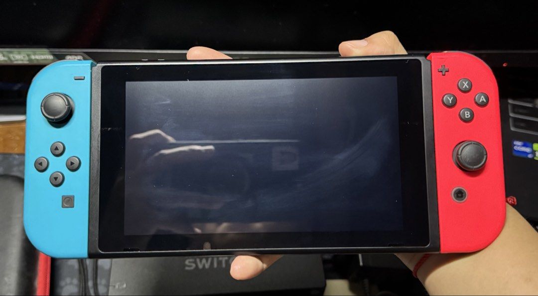 Nintendo Switch V1 (Category: Other Gadgets) located in Taguig. Submitted by skibbiditoilet (Listing ID 1461217699, Image 2). Description: WTS Nintendo Switch V1 - no jailbreak, no games, no SD Card inclusions: - Nintendo Switch V1 Console - Nintendo Switch Dock - Joycon Grip - Joycon Wrist Strap L & R - HDMI Cable - Charger - Case issues: have scratches on the screen (see pictures) rfs: decluttering 📍taguig.