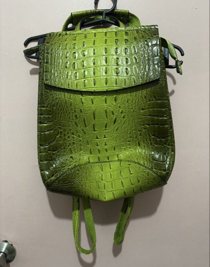 NWT Vegan Leather Sage Croc Convertible Backpack (Category: Luxury Bags & Wallets) located in Baguio. Submitted by declutter94 (Listing ID 1461248478, Image 1). Description: VIRAGO Convertible Backpack in Sage Green. Stylish and versatile, perfect for everyday use, work, school, or travel. • Vegan leather croc finish • Convertible design • Double inside zipper pockets • Back zipper pocket • Side snaps • Color: Sage Green • Size: OS • Condition: N