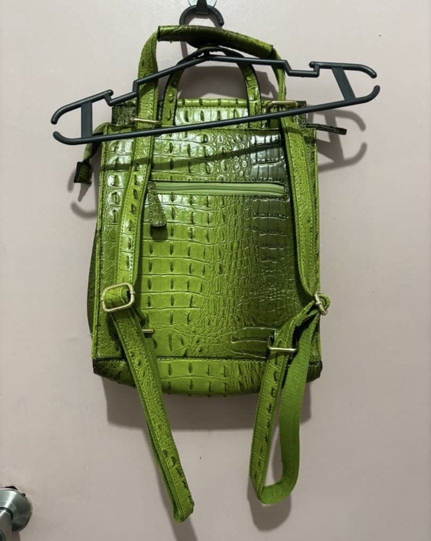 NWT Vegan Leather Sage Croc Convertible Backpack (Category: Luxury Bags & Wallets) located in Baguio. Submitted by declutter94 (Listing ID 1461248478, Image 2). Description: VIRAGO Convertible Backpack in Sage Green. Stylish and versatile, perfect for everyday use, work, school, or travel. • Vegan leather croc finish • Convertible design • Double inside zipper pockets • Back zipper pocket • Side snaps • Color: Sage Green • Size: OS • Condition: N
