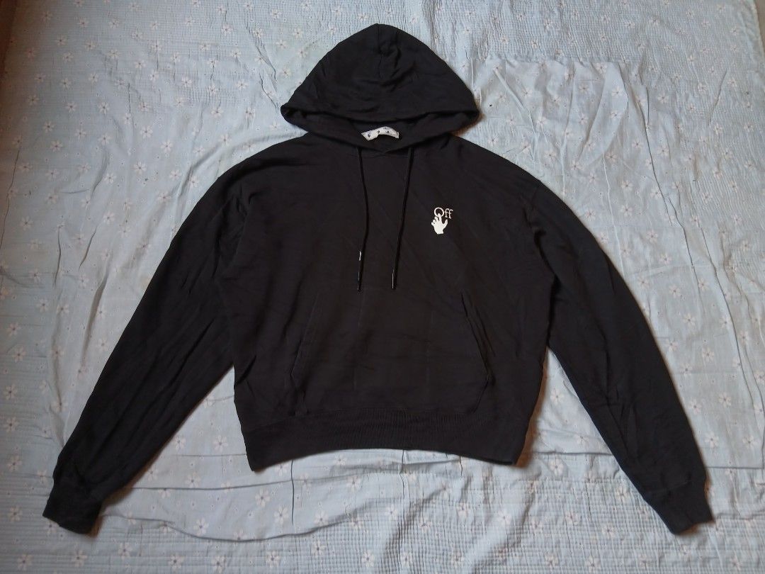 OFF-WHITE "CUT HERE" Arrows Hoodie Black (Category: Hoodies) located in Caloocan City. Submitted by youngmoon_51e2c6 (Listing ID 1461213621, Image 1). Description: - Authentic Black OFF-WHITE hoodie - Iconic OFF-WHITE arrows graphic on the back - Unique 'CUT HERE' detail on the back - Small hand logo on the front chest - Adjustable drawstrings for the hood - Convenient kangaroo pocket - Tag reads 'White™ Main'.