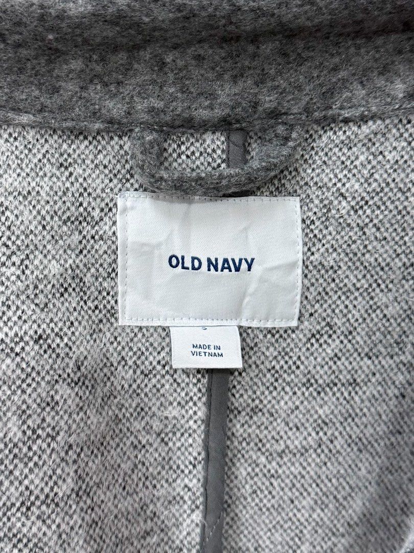 Old Navy Grey Soft, Wool-like Coat (Category: Coats, Jackets and Outerwear) located in Cabanatuan. Submitted by alysanne0910 (Listing ID 1461122301, Image 3). Description: Size: S Can do shipping nationwide. Courier: J&T. Shipping fee to be shouldered by buyer. - Old Navy Grey Wool Blend Coat - Button front closure - High collar with button detail - Hits around the knee - Ideal for cooler weather - Made in Vietnam.