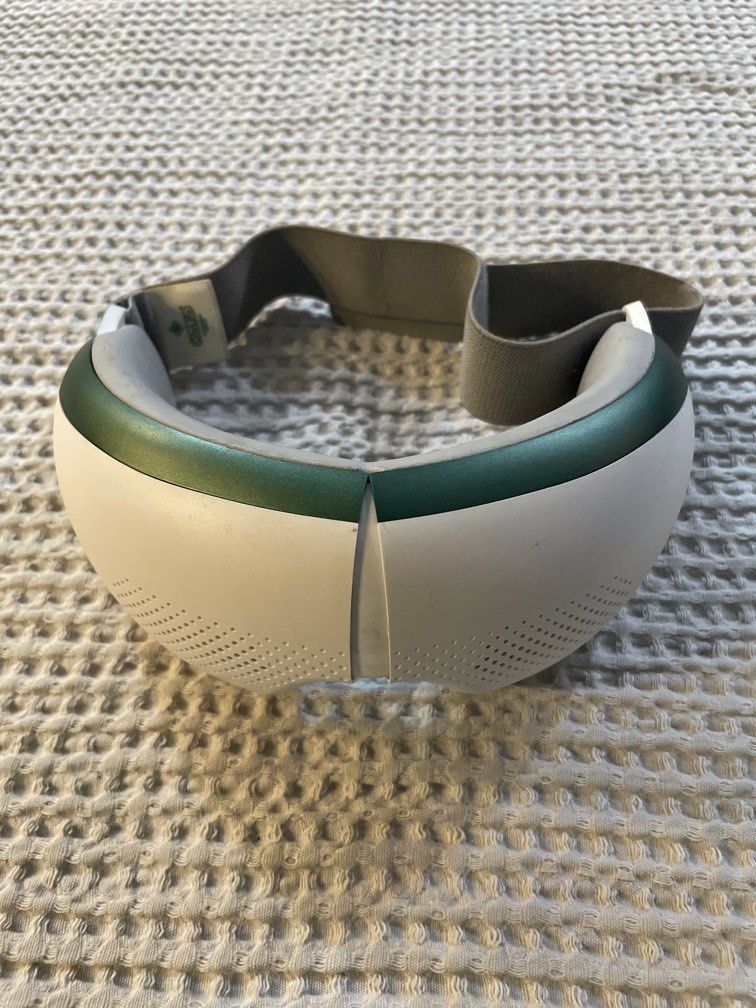 OlyLife Galaxy G-One smart eye massager (Category: Massage Devices) located in Las Pinas. Submitted by yourneighbortotoro (Listing ID 1461270395, Image 1). Description: OlyLife Galaxy G-One PEMF Smart Eye Massager — White & Emerald Green ✨ An advanced wearable eye care device combining 7.8Hz Pulsed Electromagnetic Field (PEMF) technology with 3D airbag kneading, vibration massage, and graphene warm compression to relieve eye strain and fatigue. �