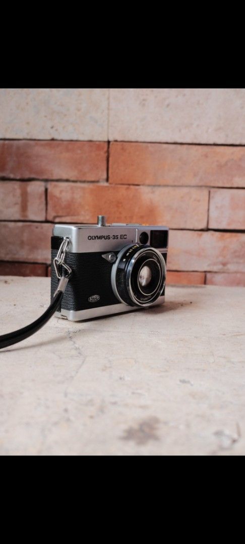Olympus 35 EC Film Camera (Category: Cameras) located in Cebu City. Submitted by monts21 (Listing ID 1461179692, Image 3). Description: - Olympus 35 EC film camera - Comes with a strap and lens cap - Tested and confirmed working -Can send sample pictures, personal collection -Battery adaptor can be found in orange app -Can use LR44 battery -battery adaptor not included .