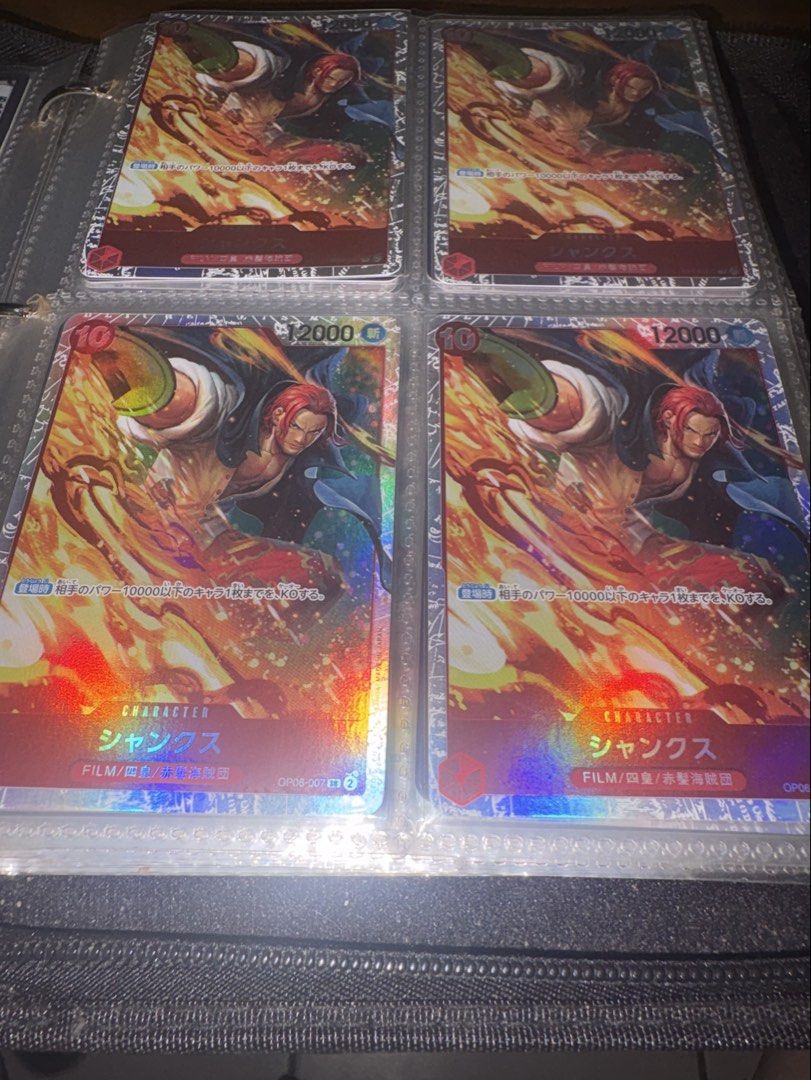 Playset / Bundle - OPC - Shanks OP06-007 SR Japanese Version| TAKE ALL (Category: Raw Singles) located in Pasig City. Submitted by missarl (Listing ID 1461156806, Image 1). Description: TAKE ALL!!! 4 pcs. ! Playset / Bundle Selling authentic One Piece Card Game Shanks OP06-007 SR (Super Rare) in Japanese! Card Details: Character: Shanks (シャンクス) Card Code: OP06-007 SR Set: Wings of the Captain (OP-06) Rarity: Super Rare (SR Foil) Language: Japanes