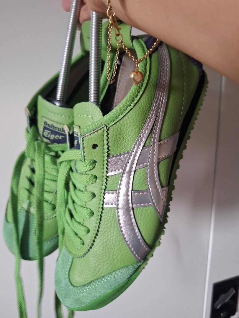 Onitsuka Tiger Mexico 66 Green Silver (Category: Sneakers) located in Marikina City. Submitted by bags21.ph (Listing ID 1461291593, Image 2). Description: - Authentic Onitsuka Tiger Mexico 66 sneakers - Color: Green with silver stripes - Material: Suede and leather upper - Laces: Green - Style: Classic, versatile for everyday wear - Features: Comfortable and stylish.