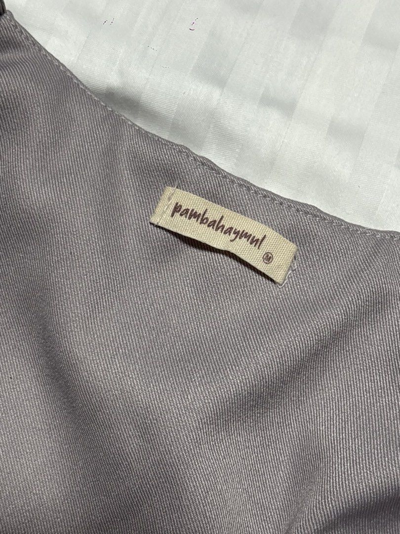 PambahayMNL Grey Button-Up Vest Size M (Category: Sleeveless) located in Pasay City. Submitted by nicoletlntn_ (Listing ID 1461230779, Image 2). Description: - Grey vest from Pambahayumul - Button-up front with four buttons - Adjustable strap at the back - Estimated size M - Ideal for layering.