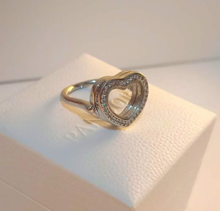 PANDORA FLOATING HEART RING (Category: Rings) located in Pasig City. Submitted by titalana2011991 (Listing ID 1461142536, Image 3). Description: ORIGINAL BRANDNEW ACTUAL PHOTO FIXED PRICE NO MEET UP PAY AS U ORDER FREE CLEANING AT ANY PANDORA STORE.