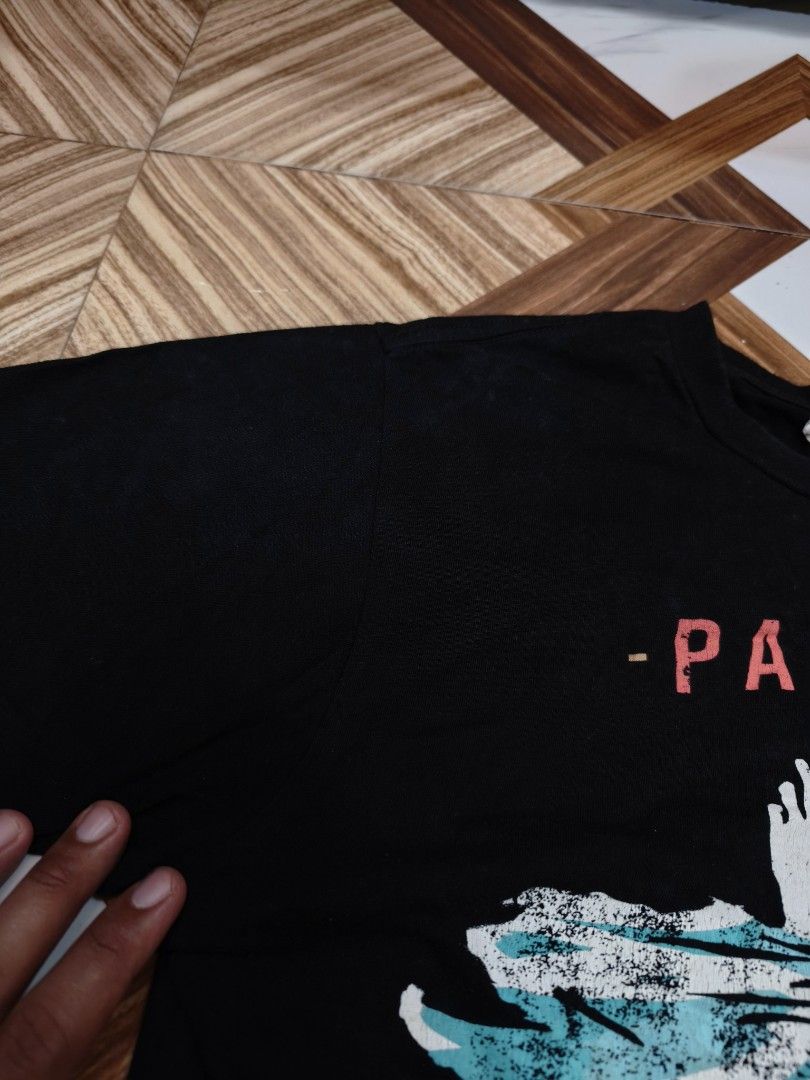 Paramore 2000s shirt (Category: Tshirts & Polo Shirts ) located in Digos. Submitted by emmanuel28 (Listing ID 1461124099, Image 3). Description: PARAMORE shirt by Startee Y2K era Dimes: 18.5 x 25 in good condition Issue may white spots. Black na black pa sana color rate 9.5/10 Buyer shoulders shipping fee.