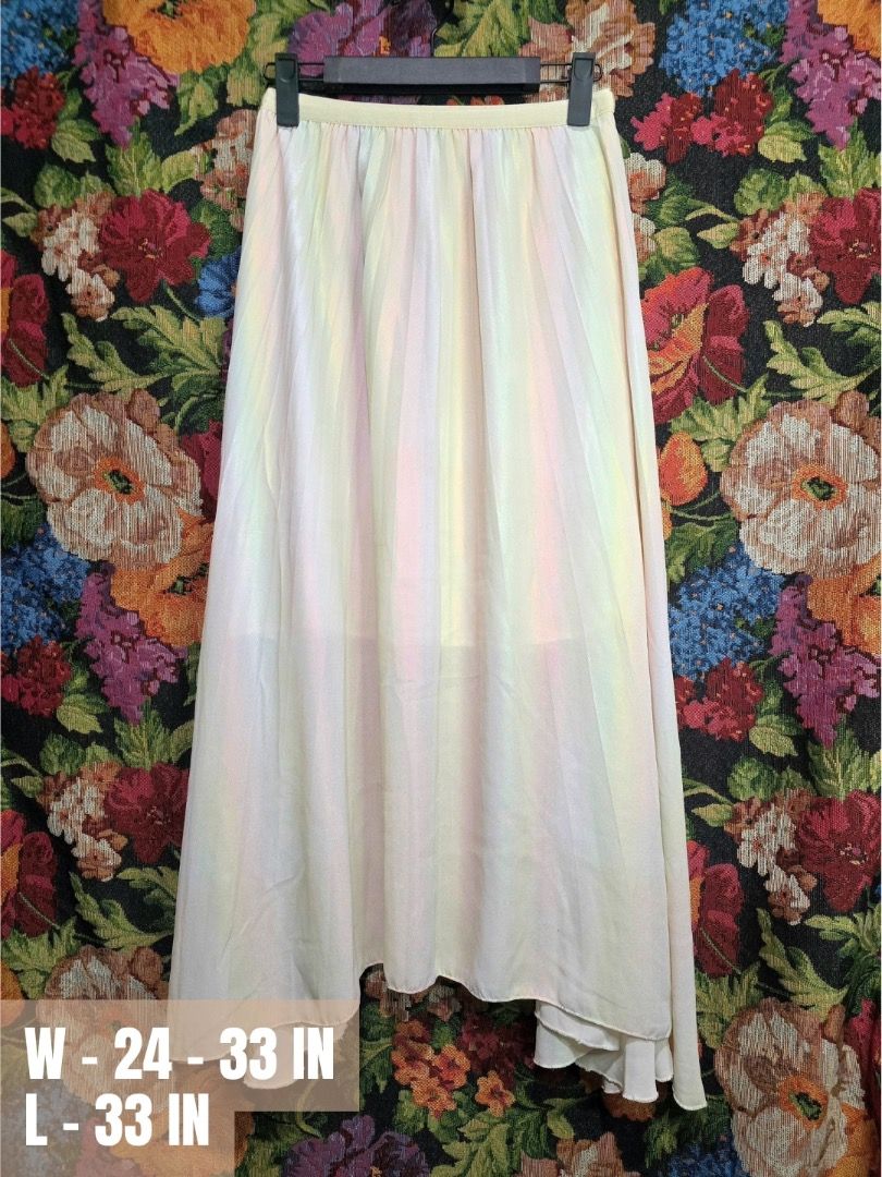 Pastel Iridescent Striped Maxi Skirt (Category: Skirts) located in Paranaque City. Submitted by titaartestudio (Listing ID 1461244620, Image 1). Description: - Flowy pastel striped maxi skirt - Comfortable elastic waistband fits 24-33 inches - Length: 33 inches - Lightweight material, perfect for warm weather - Versatile for casual or dressed-up occasions.
