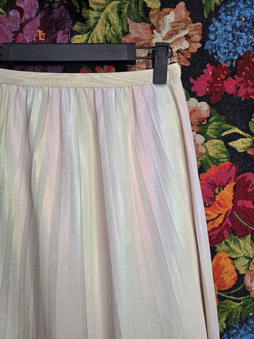 Pastel Iridescent Striped Maxi Skirt (Category: Skirts) located in Paranaque City. Submitted by titaartestudio (Listing ID 1461244620, Image 2). Description: - Flowy pastel striped maxi skirt - Comfortable elastic waistband fits 24-33 inches - Length: 33 inches - Lightweight material, perfect for warm weather - Versatile for casual or dressed-up occasions.