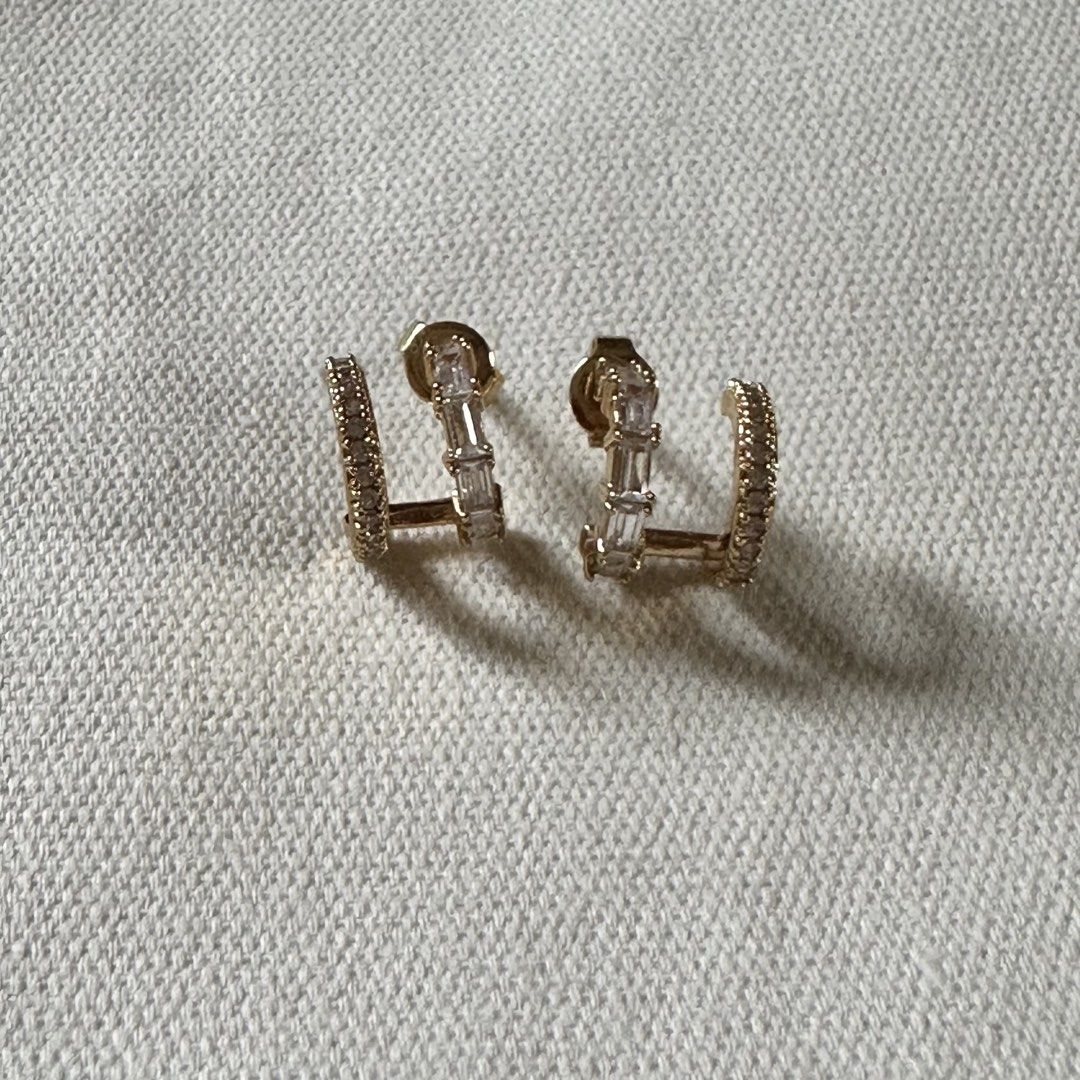Penny Pairs Illusion Earrings (Category: Earrings) located in Angeles City. Submitted by sorted.things (Listing ID 1461143834, Image 3). Description: Bought at Penny Pairs Website for 3k+ Currently style is out of stock/phased out No issues until now Only worn few times Thick 14k gold plating over brass Cubic zirconia stones Hypoallergenic Care guide: Store your jewelry individually and avoid exposing them to liquid and cosmetics. Extreme heat an