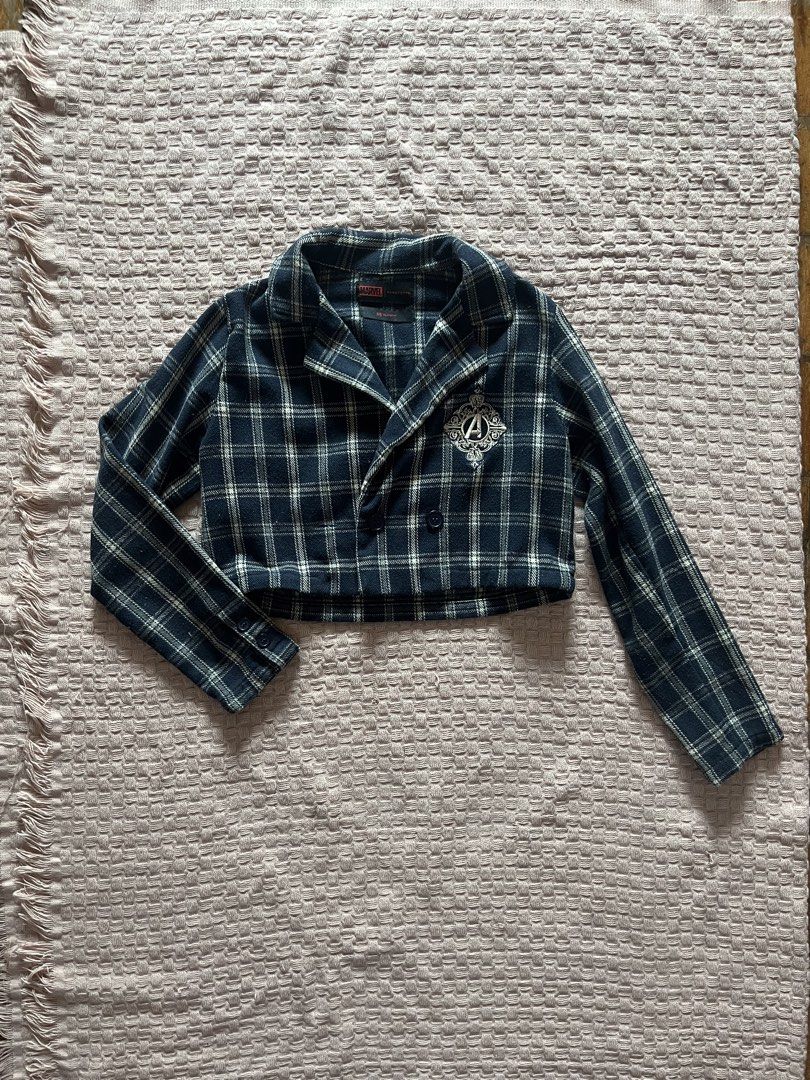 Penshoppe Marvel Plaid Coordinates (Category: Coats, Jackets and Outerwear) located in Mandaluyong City. Submitted by hopeworldplane (Listing ID 1461162772, Image 2). Description: - Navy and white plaid cropped jacket - Features embroidered Marvel logo on chest - Button-up front with collar - Long sleeves - School uniform inspired style.