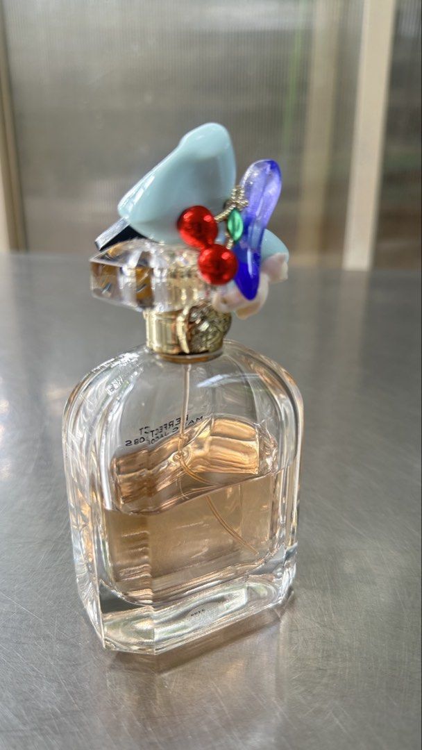 Perfect by Marc Jacobs EDP (Category: Fragrance & Deodorants) located in Makati City. Submitted by sheheynnn_ (Listing ID 1461182754, Image 2). Description: Selling my personal perfume, around 65% juice level left. Mabango siya, classy yung scent. Perfect for everyday use! RFS: Decluttering Loc: Dasma Village, Makati.