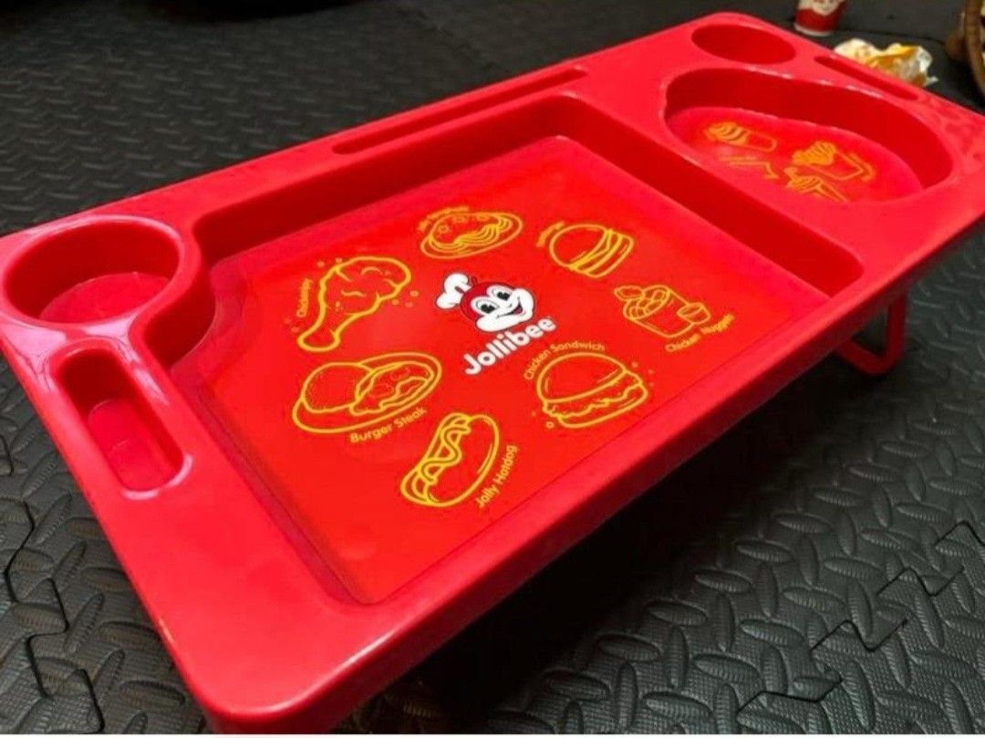 Philippine release Jollibee Travel Tray version 2 (Category: Travel Essentials & Accessories) located in Manila. Submitted by yadordioni08067 (Listing ID 1461319177, Image 1). Description: version 2 of the Jollibee Food Tray, the stands are foldable. brandnew. 2pc available. 2 for 750 only. I can also throw in a preloved as a 3rd tray, 3 for 1000 only..